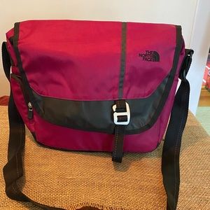 The North Face small messenger bag.  Magenta/Black